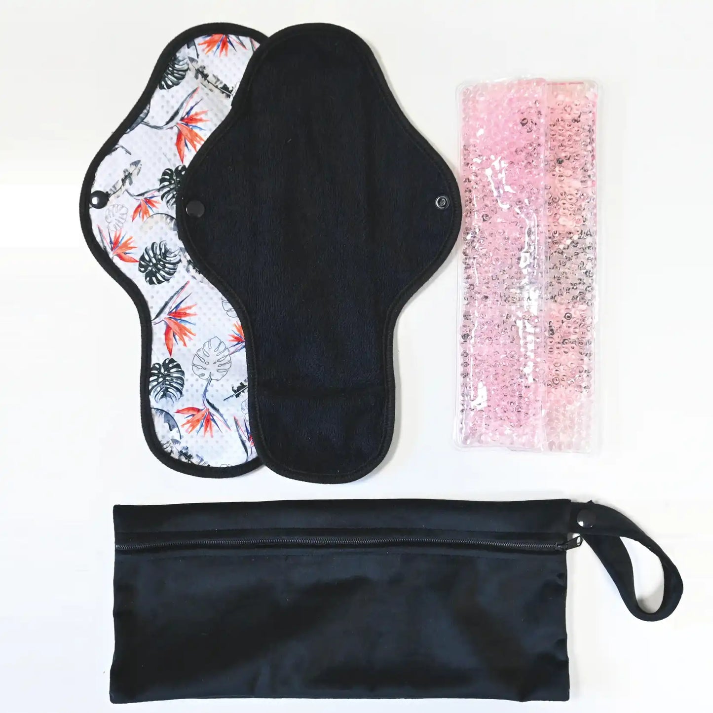 Règle douloureuse : 2 serviettes + 2 pads soulageant chaud / froid + 1 pochette