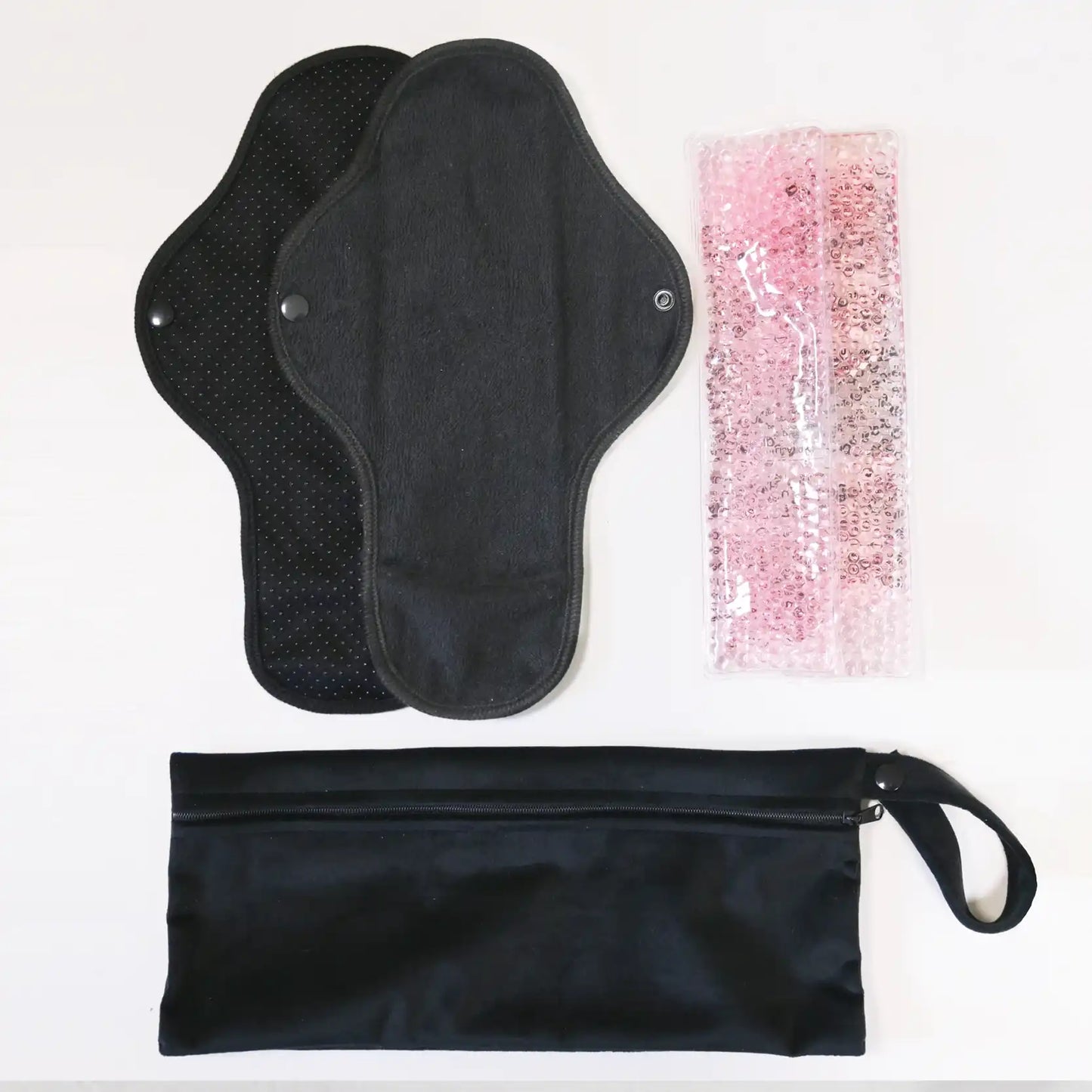 Règle douloureuse : 2 serviettes + 2 pads soulageant chaud / froid + 1 pochette