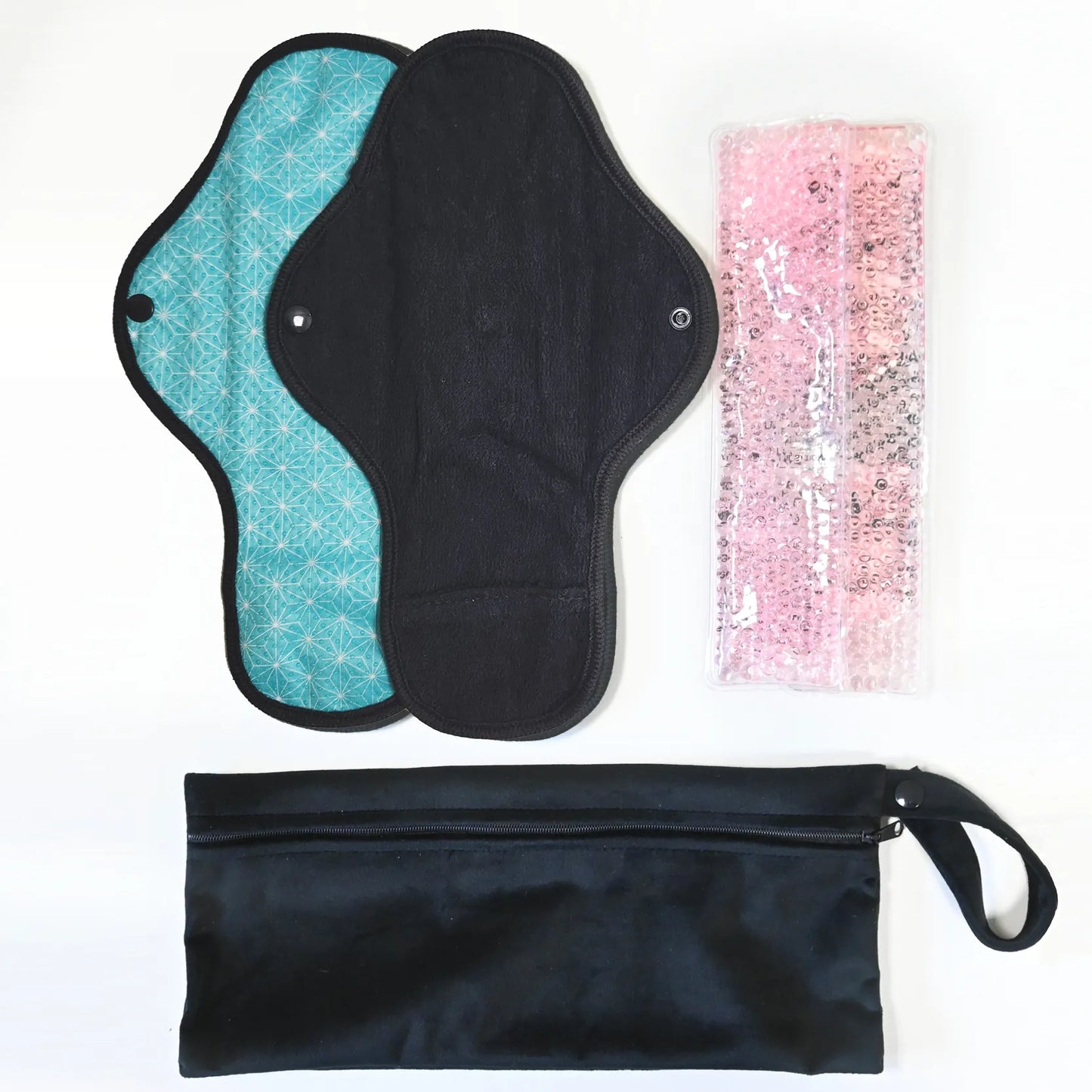 Règle douloureuse : 2 serviettes + 2 pads soulageant chaud / froid + 1 pochette